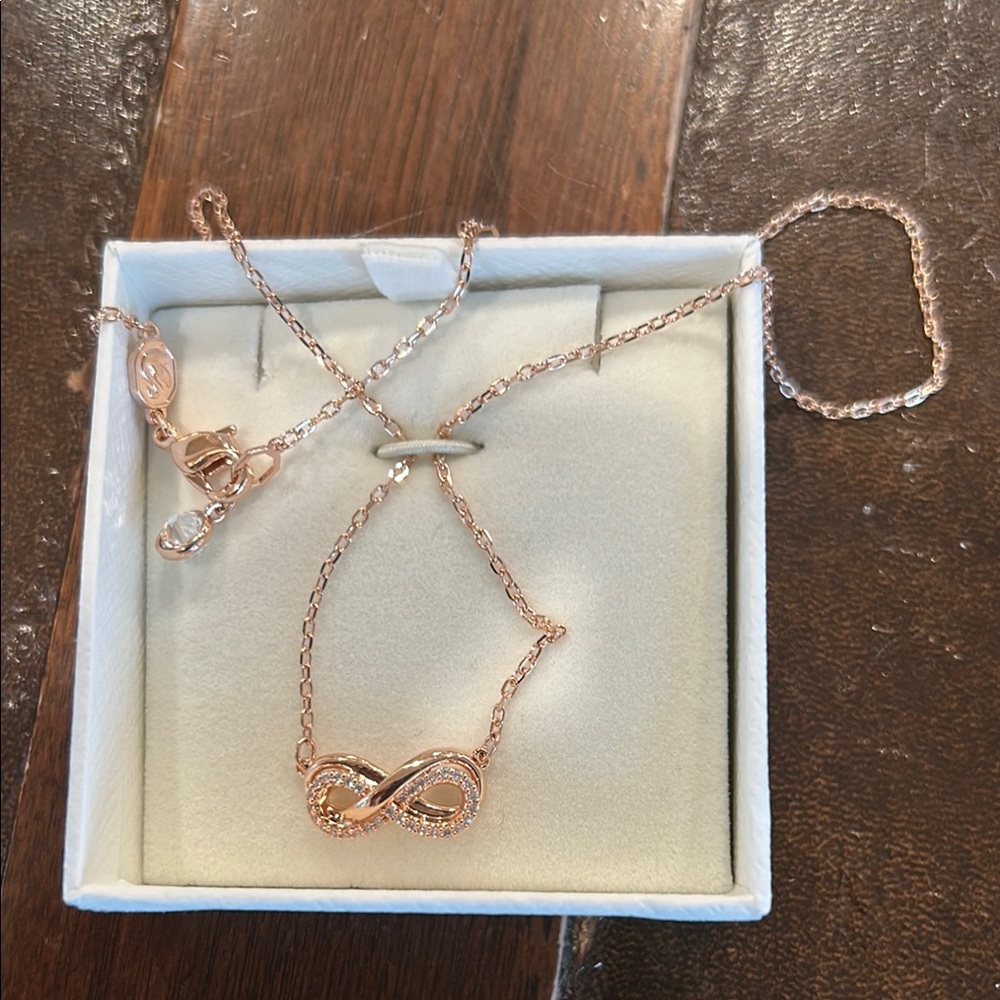 Swarovski Elegant Rose Gold Infinity necklace. Brand new